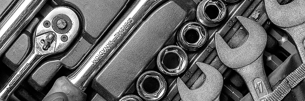 Black and white of tools from above.